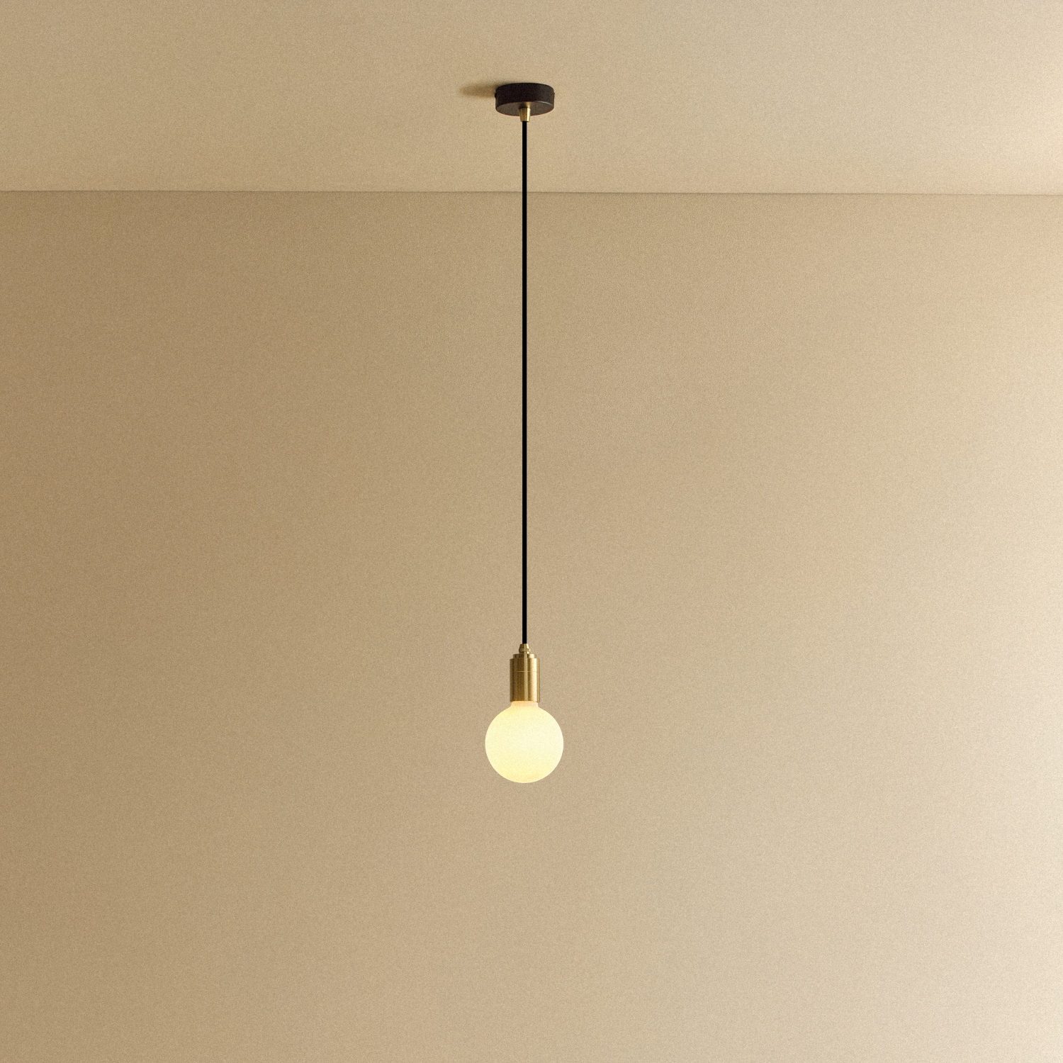 Tala Sphere III Pendant Light in Brass shown illuminated