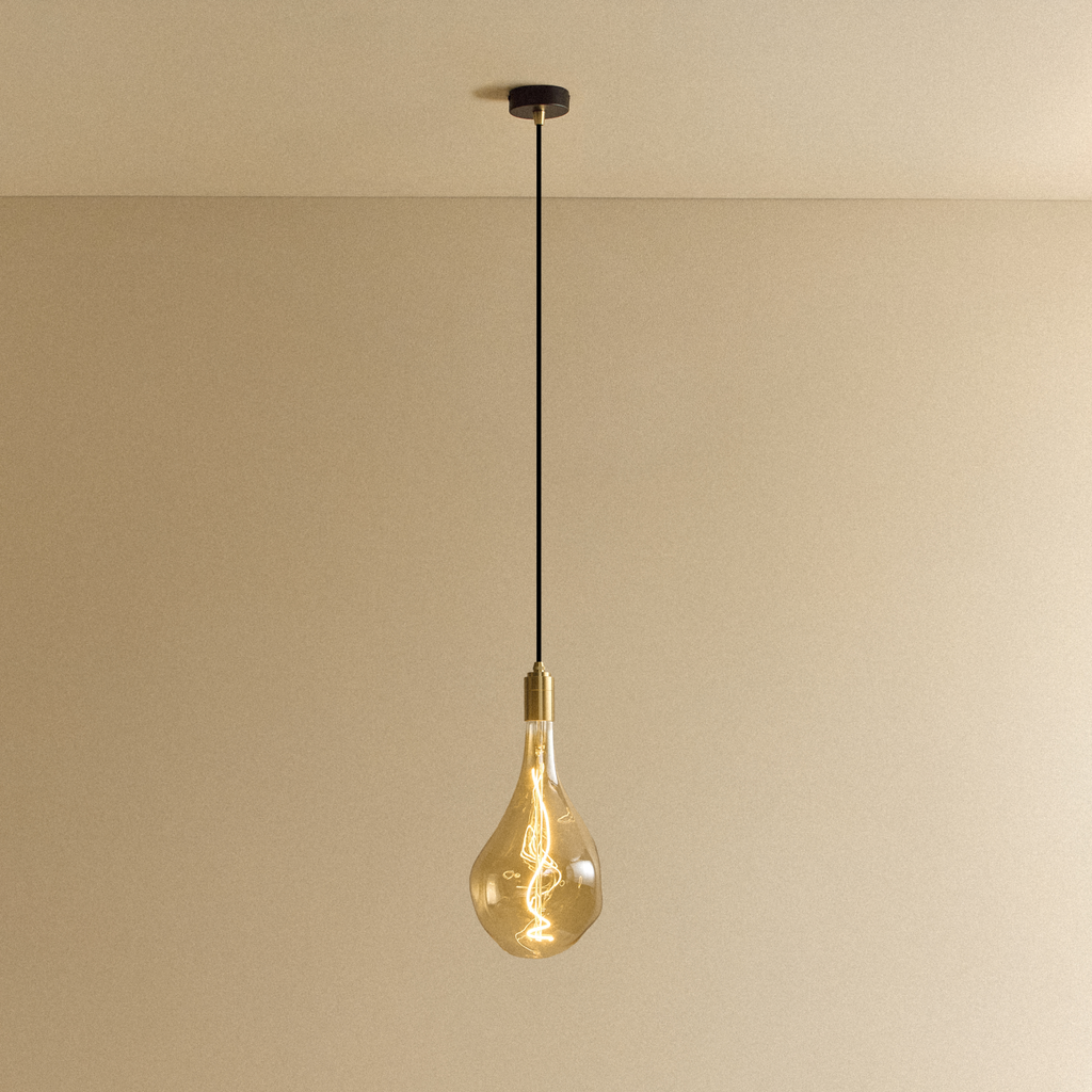 Tala Voronoi III Pendant Light in Brass shown illuminated