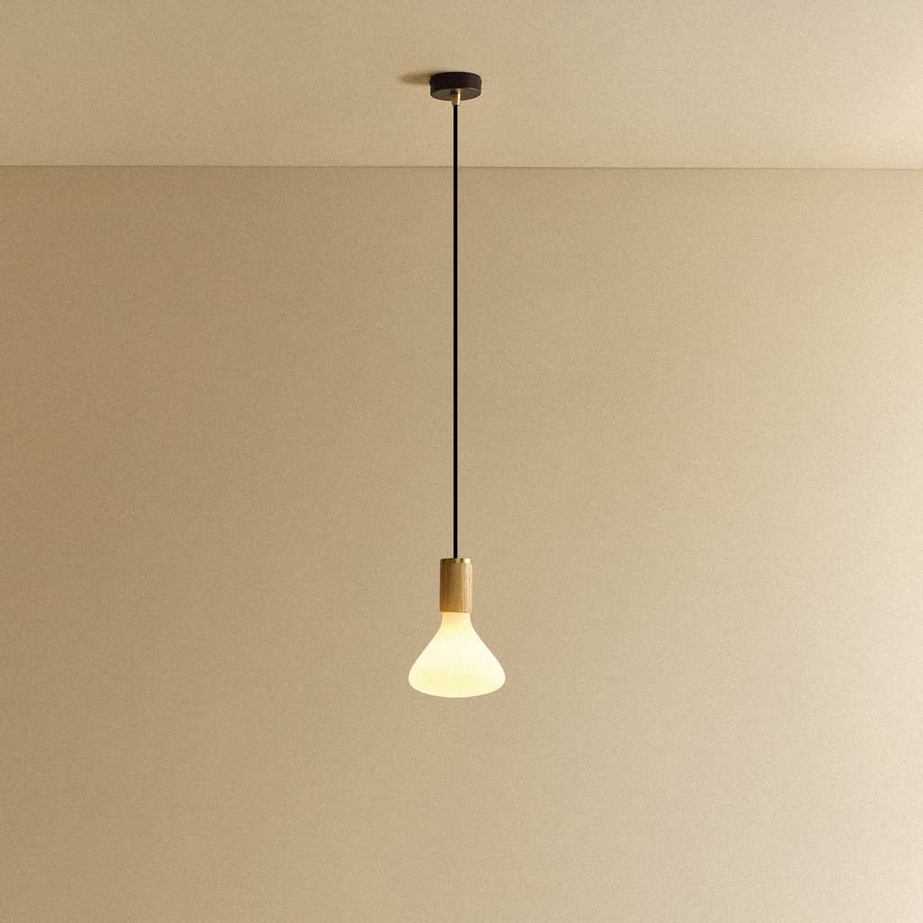 Tala Noma Pendant Light in Oak shown illuminated