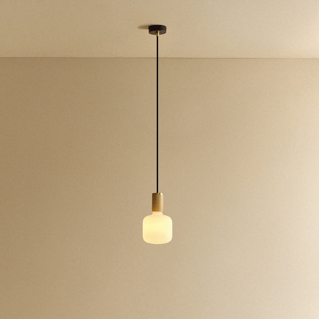 Tala Oblo Pendant Light in Oak shown illuminated