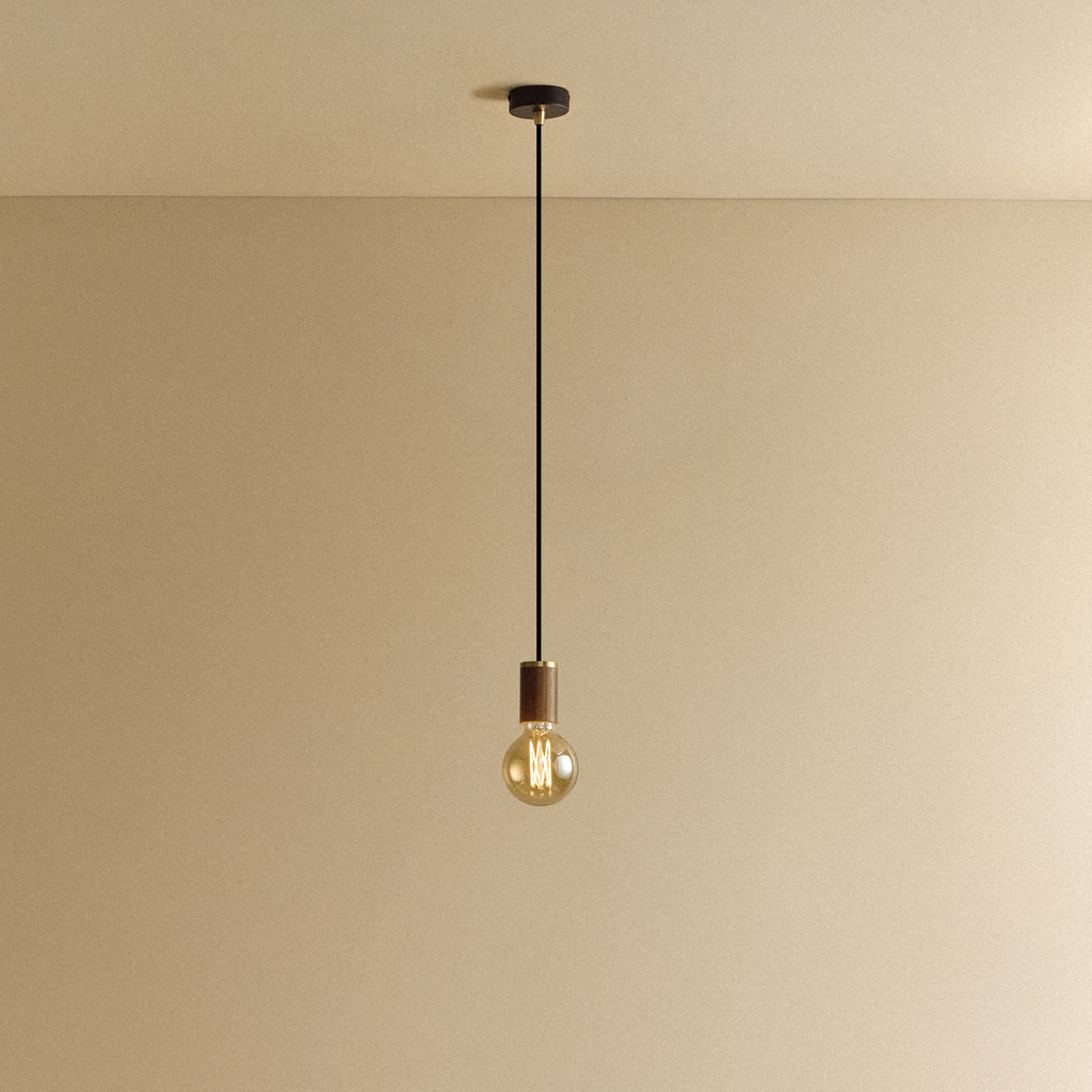Tala Elva Pendant Light Tinted in Walnut shown illuminated