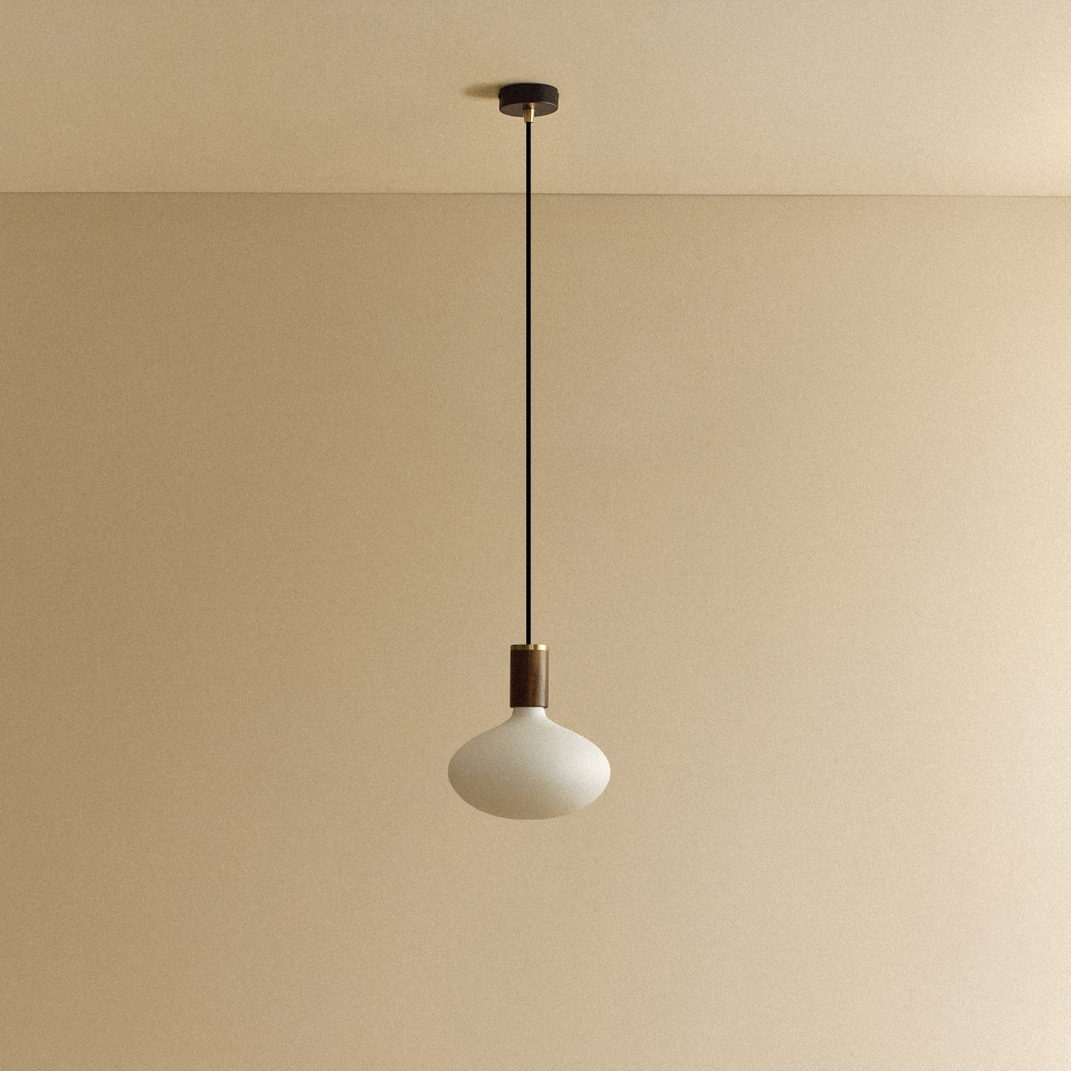 Tala Oval Dim-to-Warm Pendant Light in Walnut shown unlit