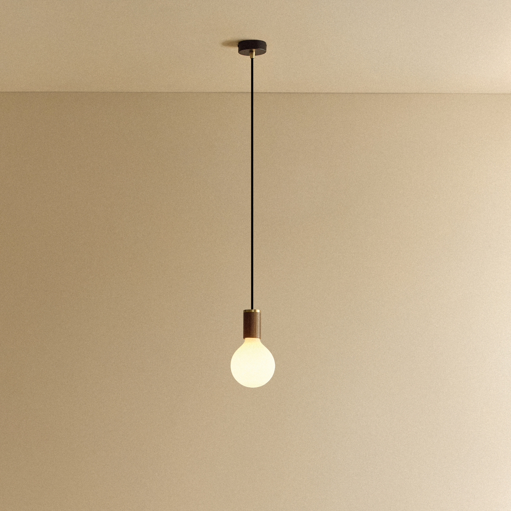 Tala Porcelain III Pendant Light in Walnut shown illuminated