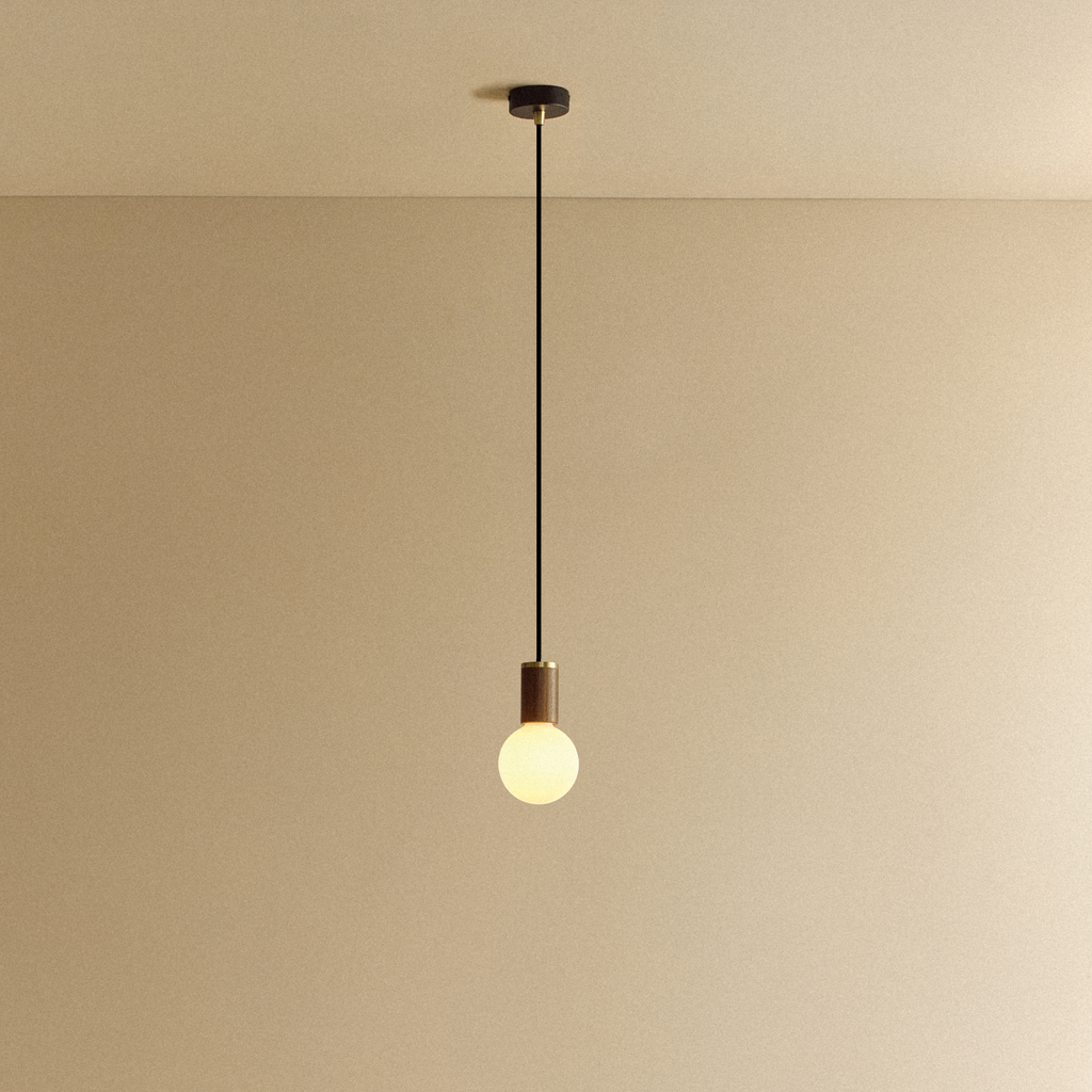 Tala Sphere III Pendant Light in Walnut shown illuminated