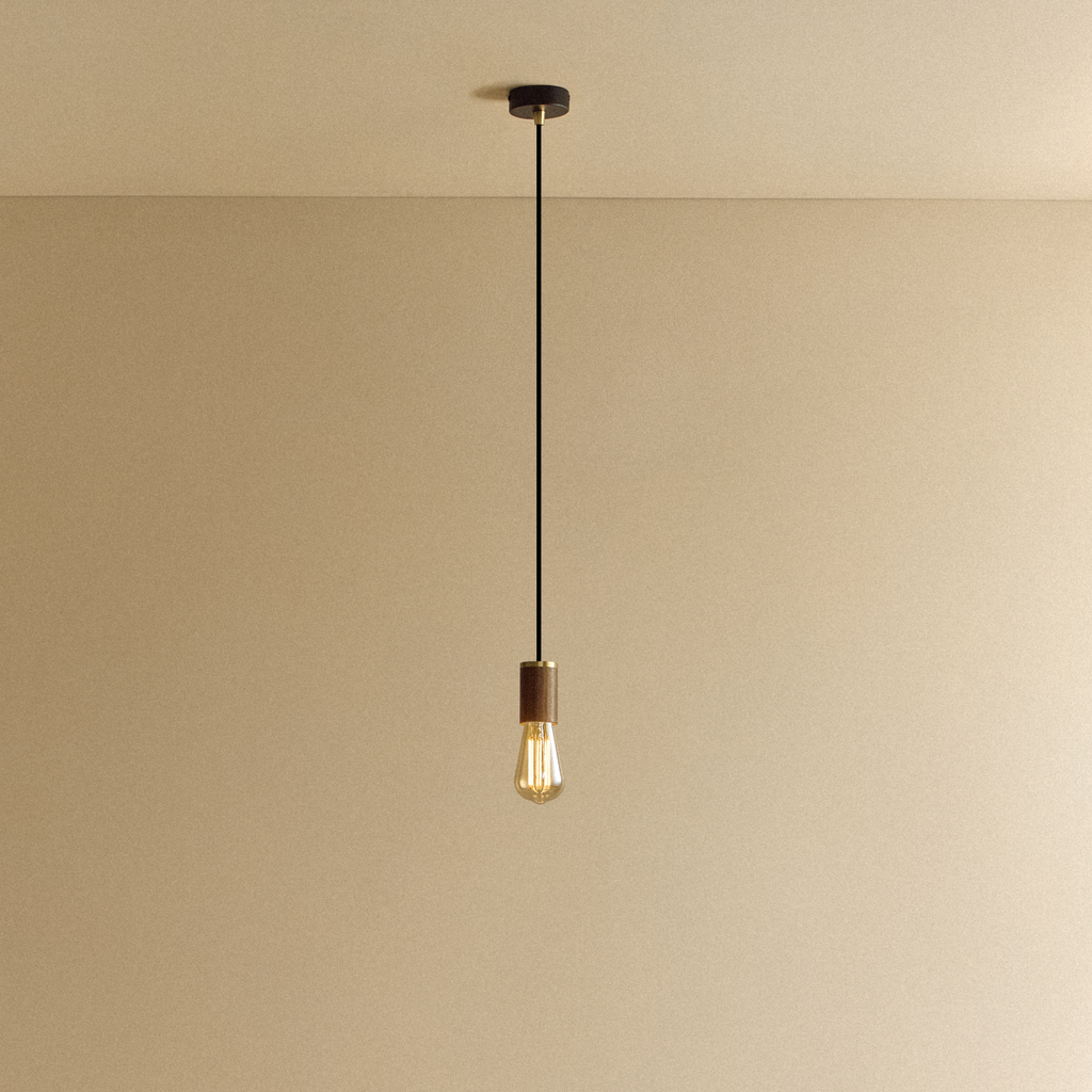 Tala Squirrel Cage Pendant Light in Walnut shown illuminated