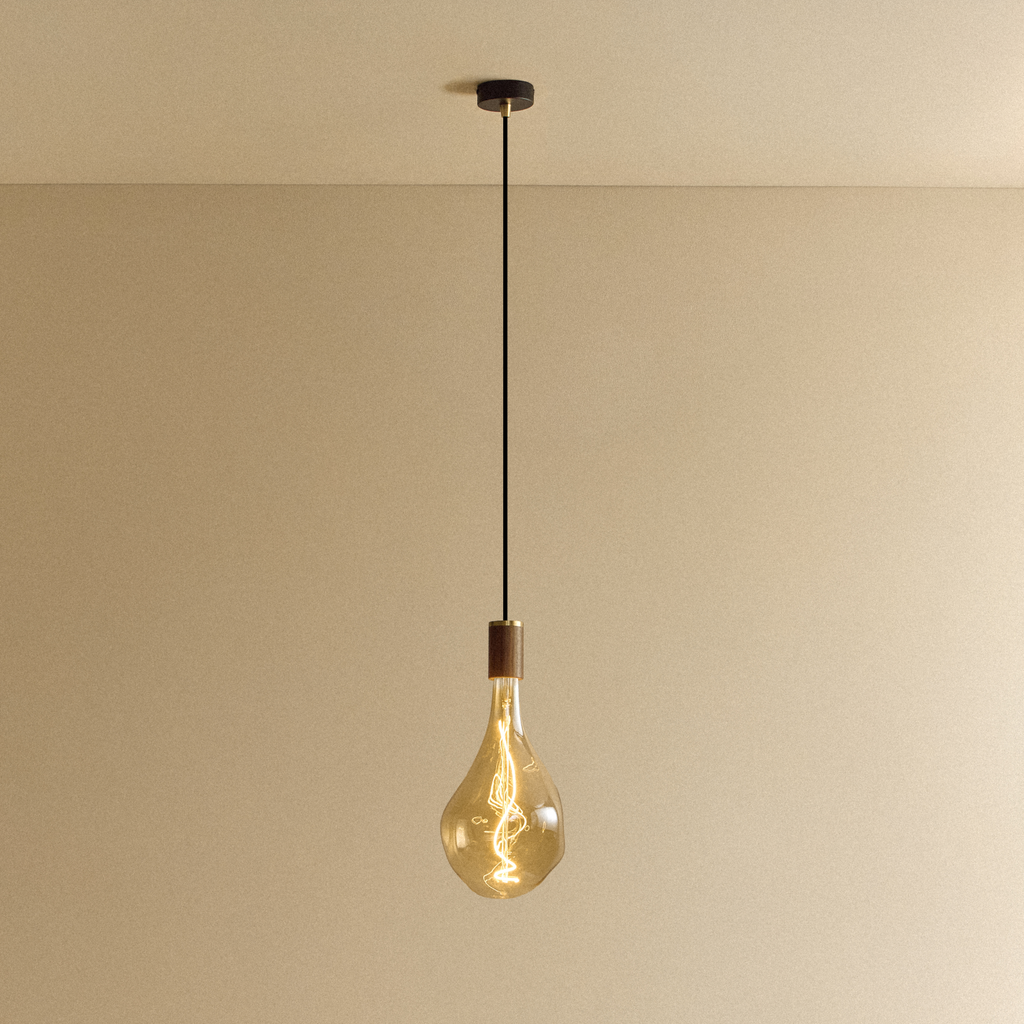 Tala Voronoi III Pendant Light in Walnut shown illuminated