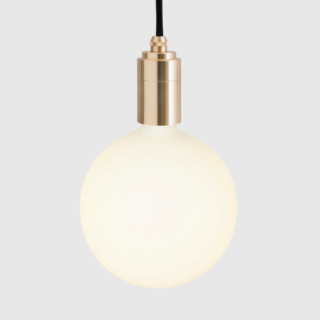 Tala Linear Triple Pendant in Brass + Sphere IV shown illuminated (view 2)