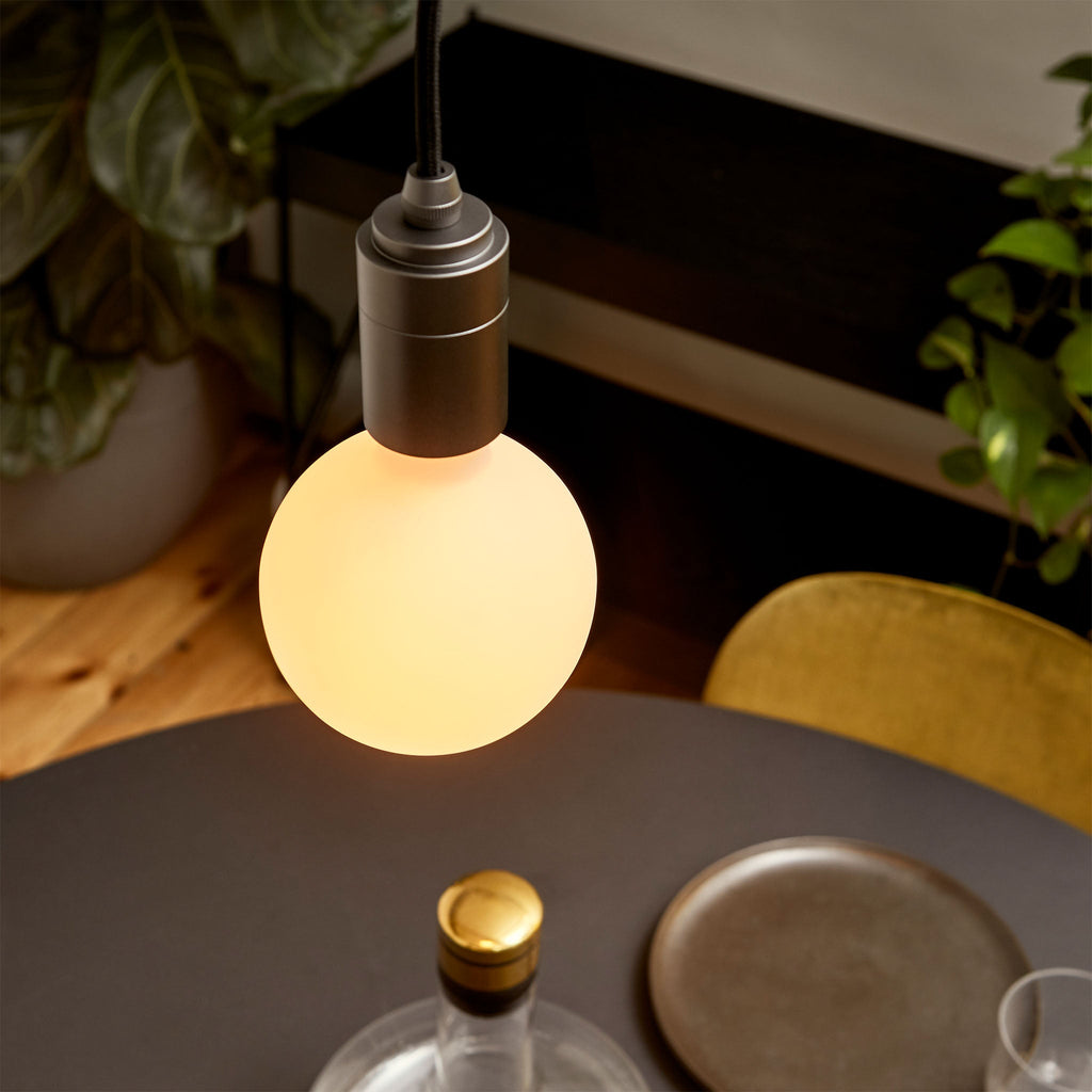Tala Sphere III Pendant Light in Graphite in a styled interior setting (view 2)