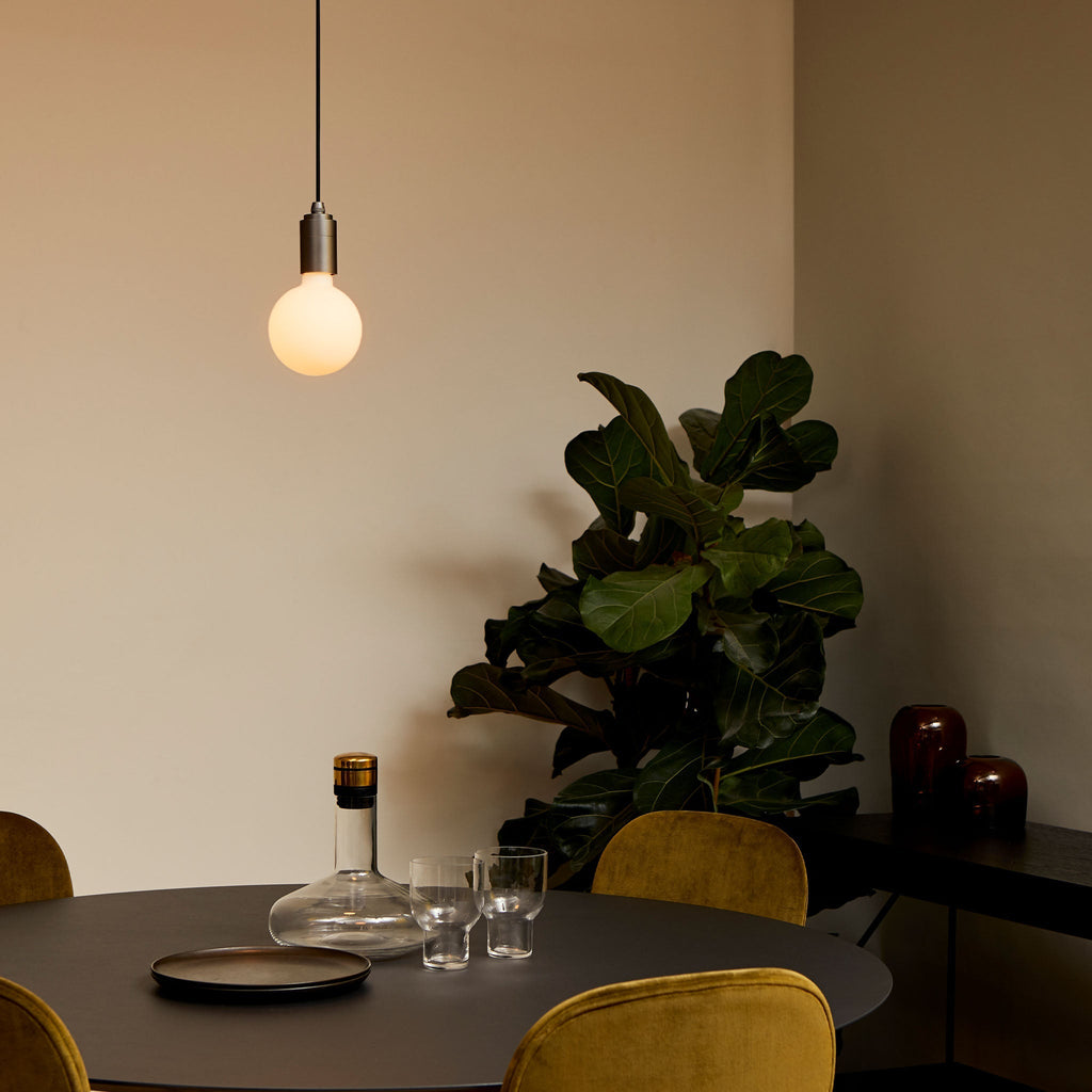 Tala Sphere III Pendant Light in Graphite in a styled interior setting