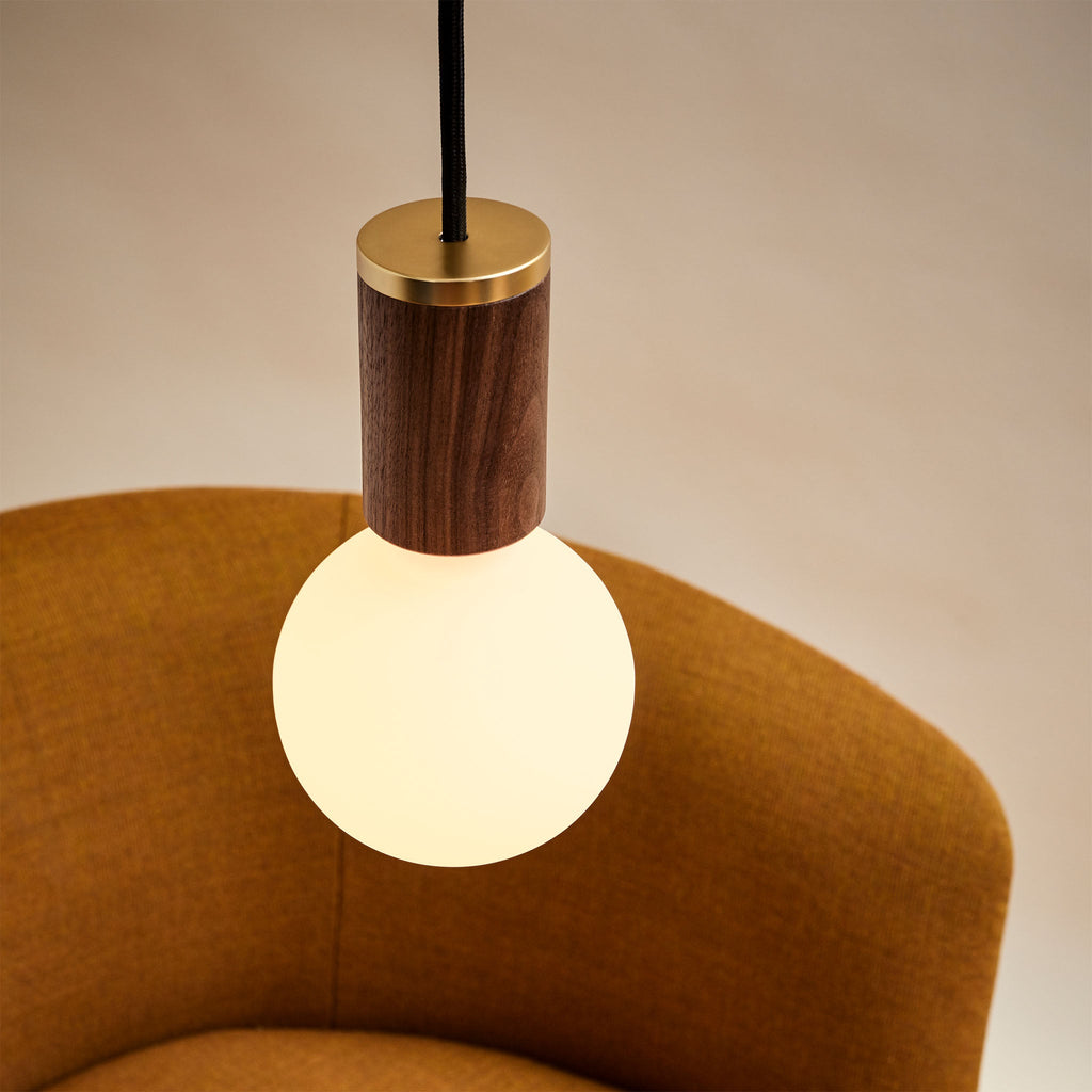 Tala Sphere III Pendant Light in Oak in a styled interior setting (view 2)