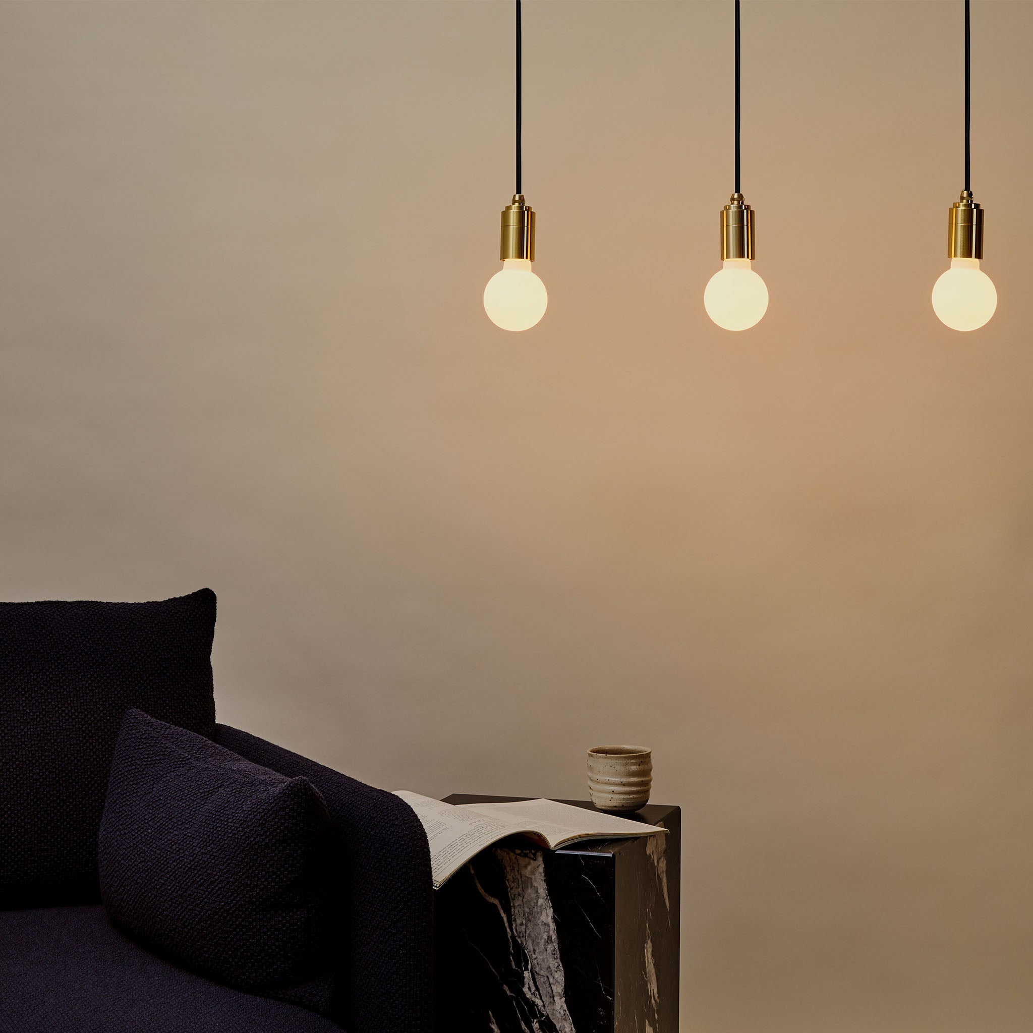 Tala Sphere II Pendant Light in Walnut in a styled interior setting (view 2)