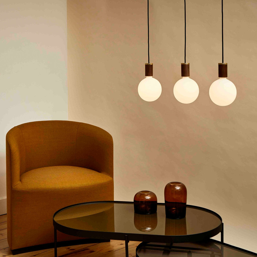 Tala Sphere IV Pendant Light in Walnut in a styled interior setting