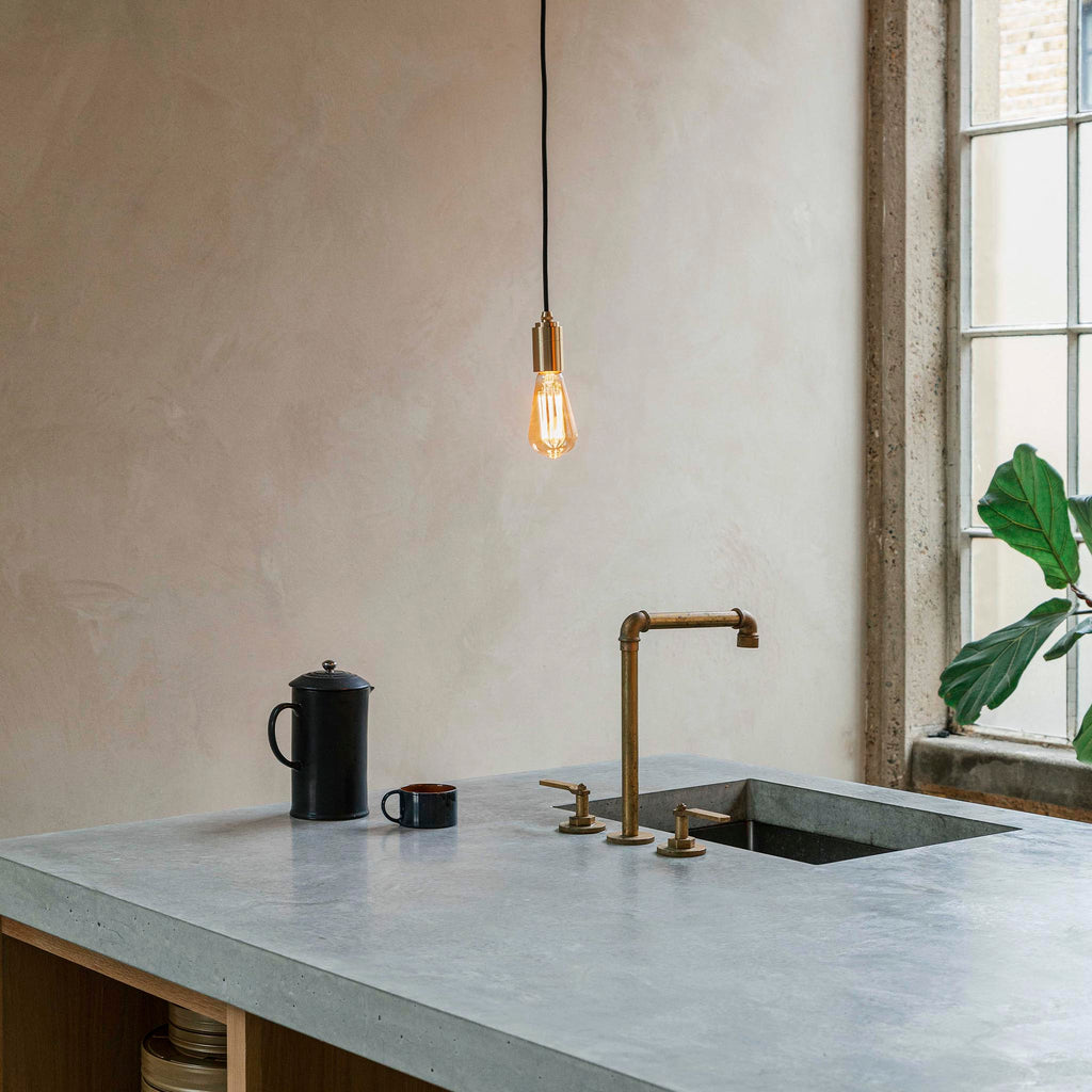 Tala Squirrel Cage Pendant Light in Oak in a styled interior setting