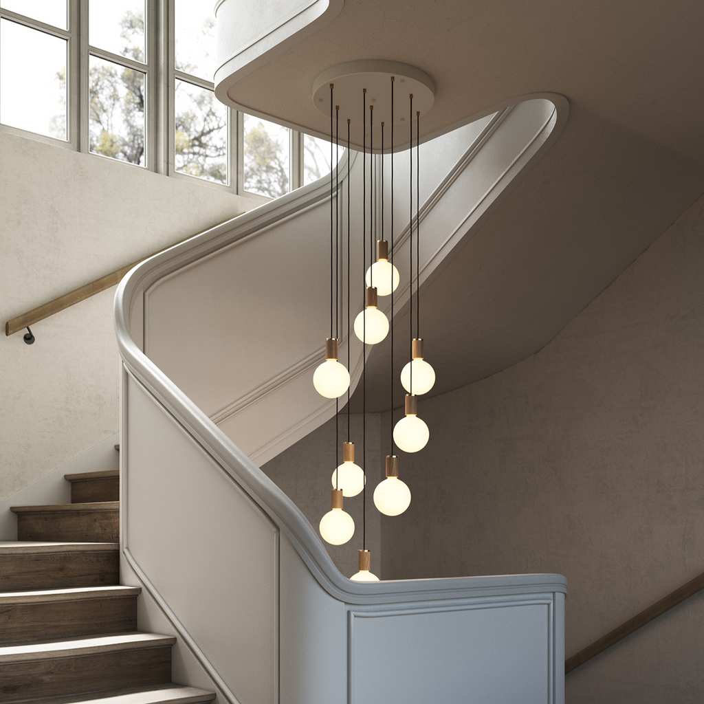 Tala Nine Pendant in Oak in a styled interior setting