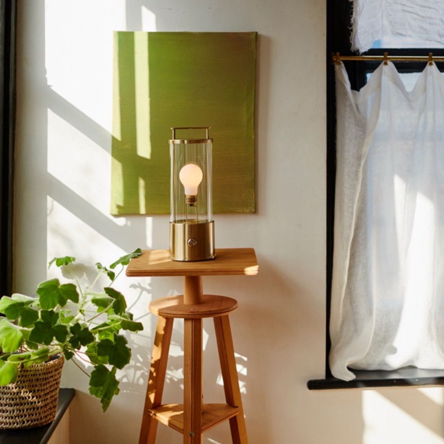 Tala The Muse 1.0 Portable Lamp in Solid Brass in a styled interior setting (view 4)