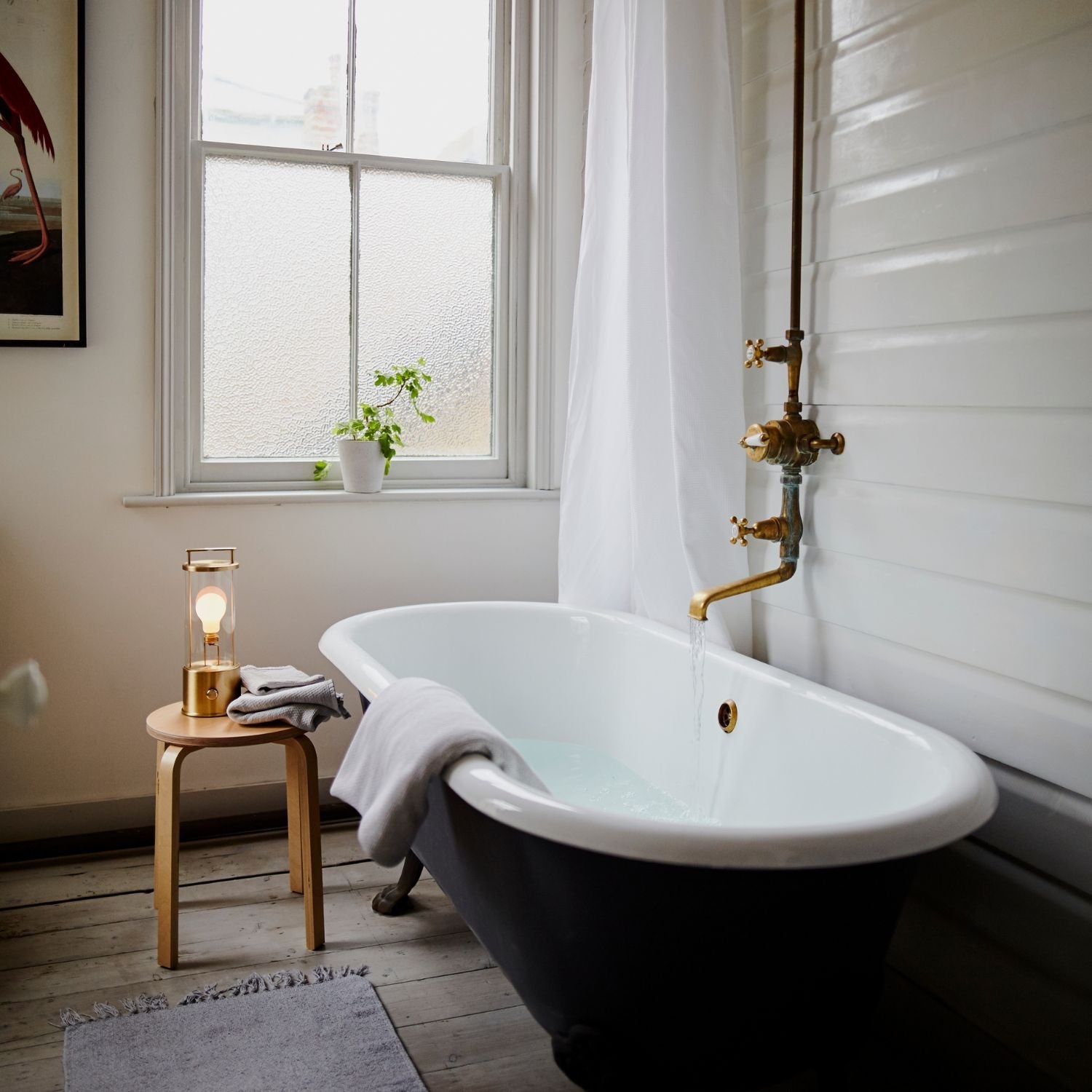 Tala The Muse 1.0 Portable Lamp in Solid Brass - Set of 2 in a styled interior setting (view 3)