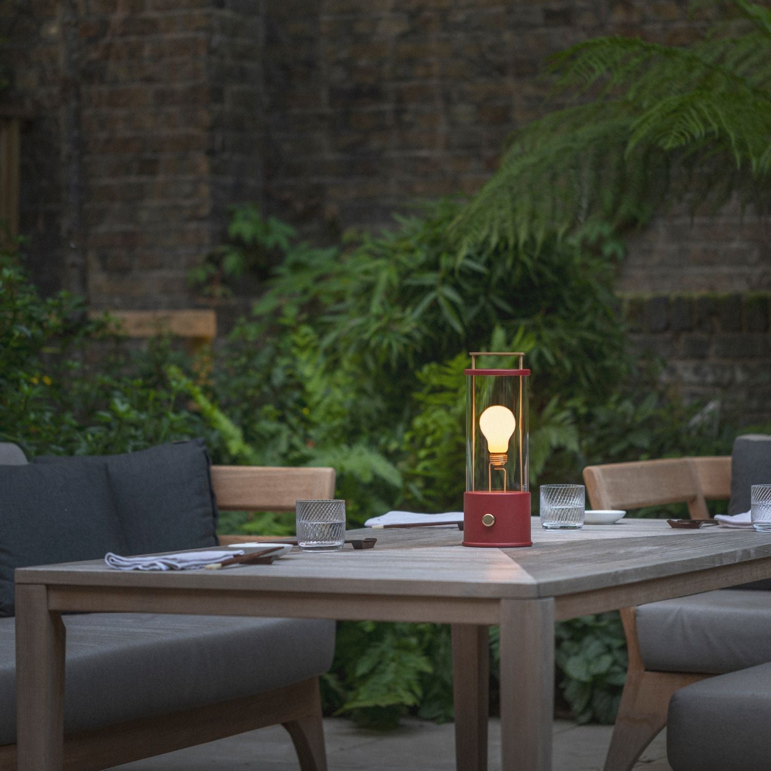 Tala The Muse 1.0 Portable Lamp in Pomona Red - Set of 2 in a styled interior setting (view 2)