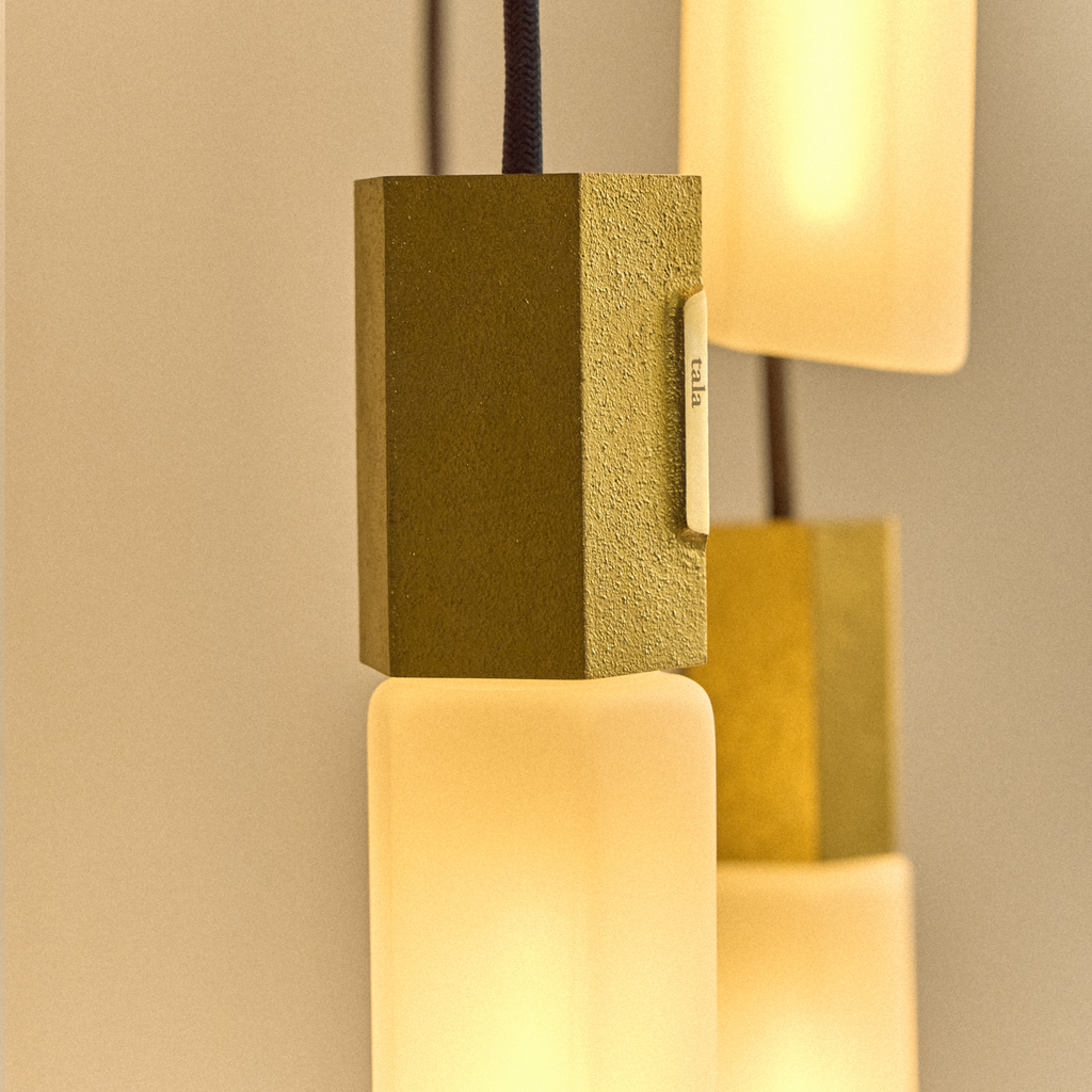 Tala Basalt Triple Pendant in Brass close-up detail of the finish