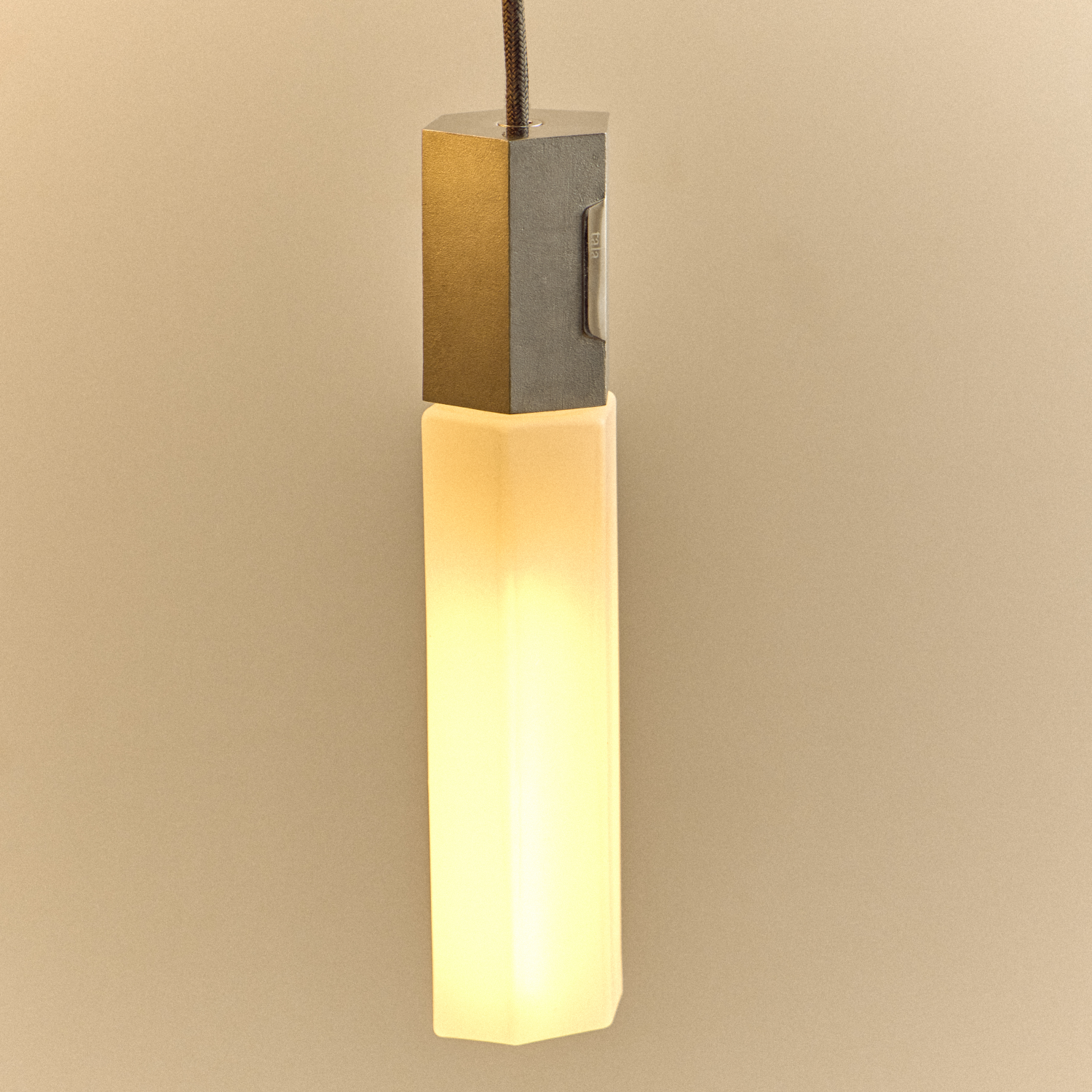 Tala Basalt Single Pendant in Stainless Steel close-up detail of the finish