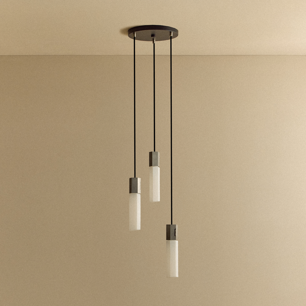 Tala Basalt Triple Pendant in Stainless Steel shown unlit