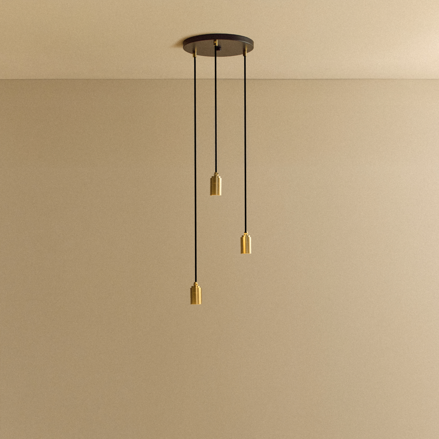 Tala Triple Pendant in Brass fixture shown without a bulb