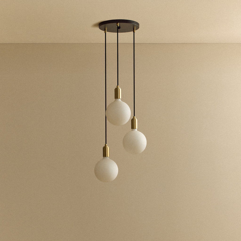 Tala Triple Pendant in Brass + Sphere IV shown unlit