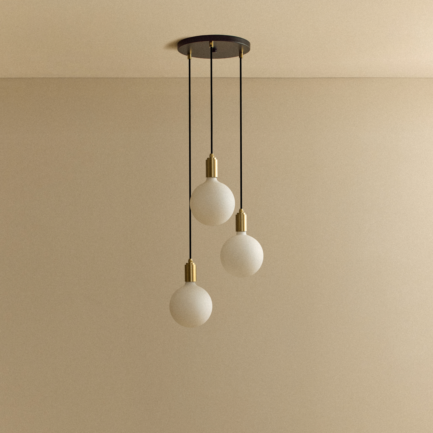 Tala Triple Pendant in Brass + Sphere IV shown unlit