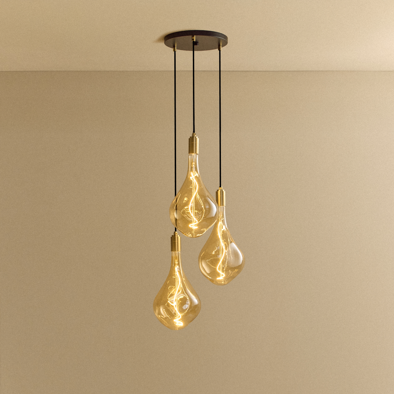 Tala Triple Pendant in Brass + Voronoi III shown illuminated