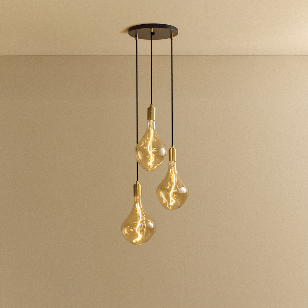 Tala Triple Pendant in Brass + Voronoi II shown illuminated