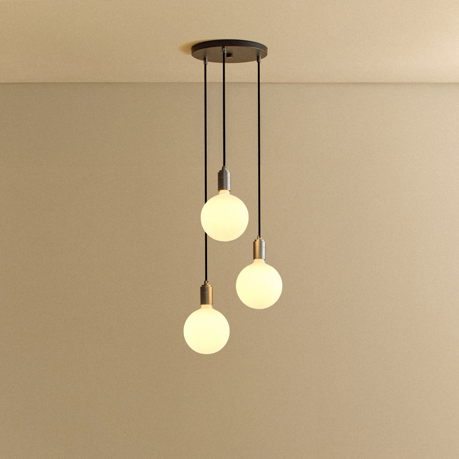 Tala Triple Pendant in Graphite + Sphere IV shown illuminated