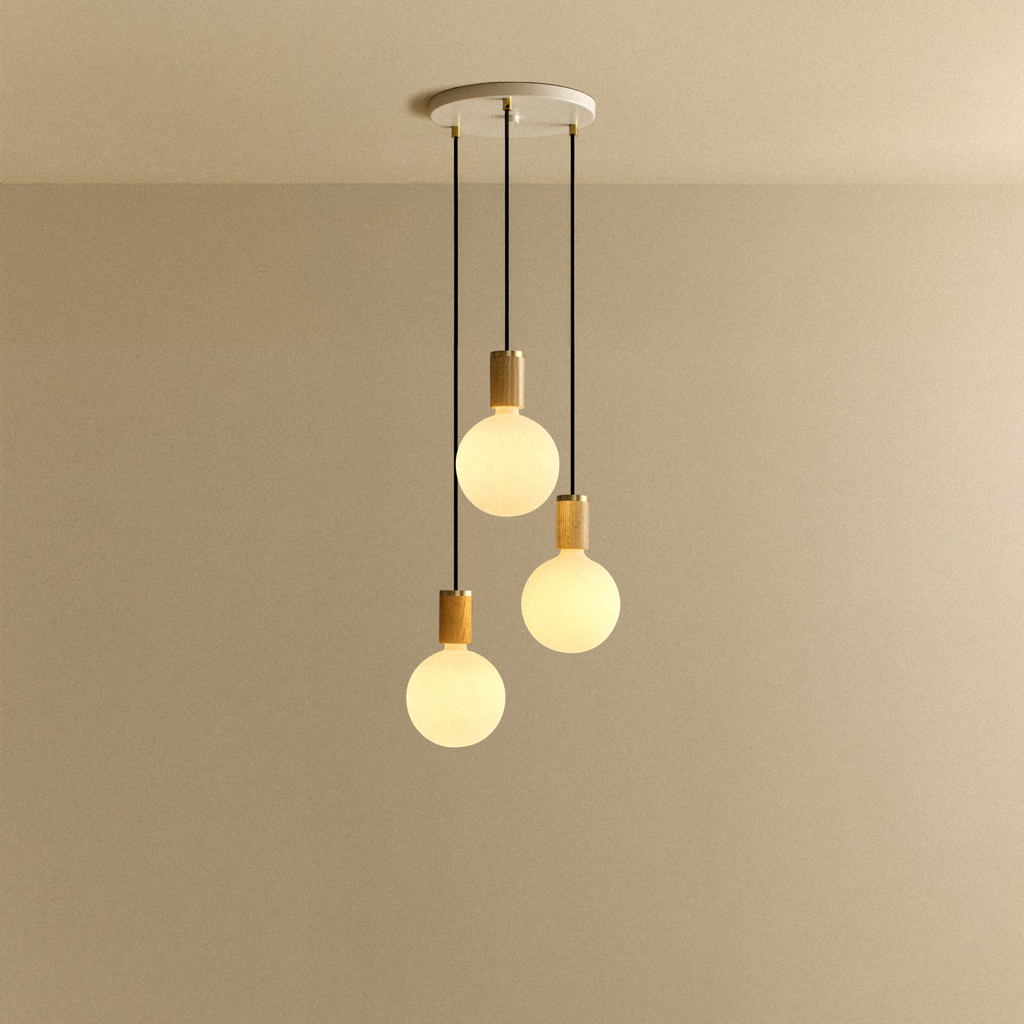 Tala Triple Pendant in Oak + Sphere IV shown illuminated