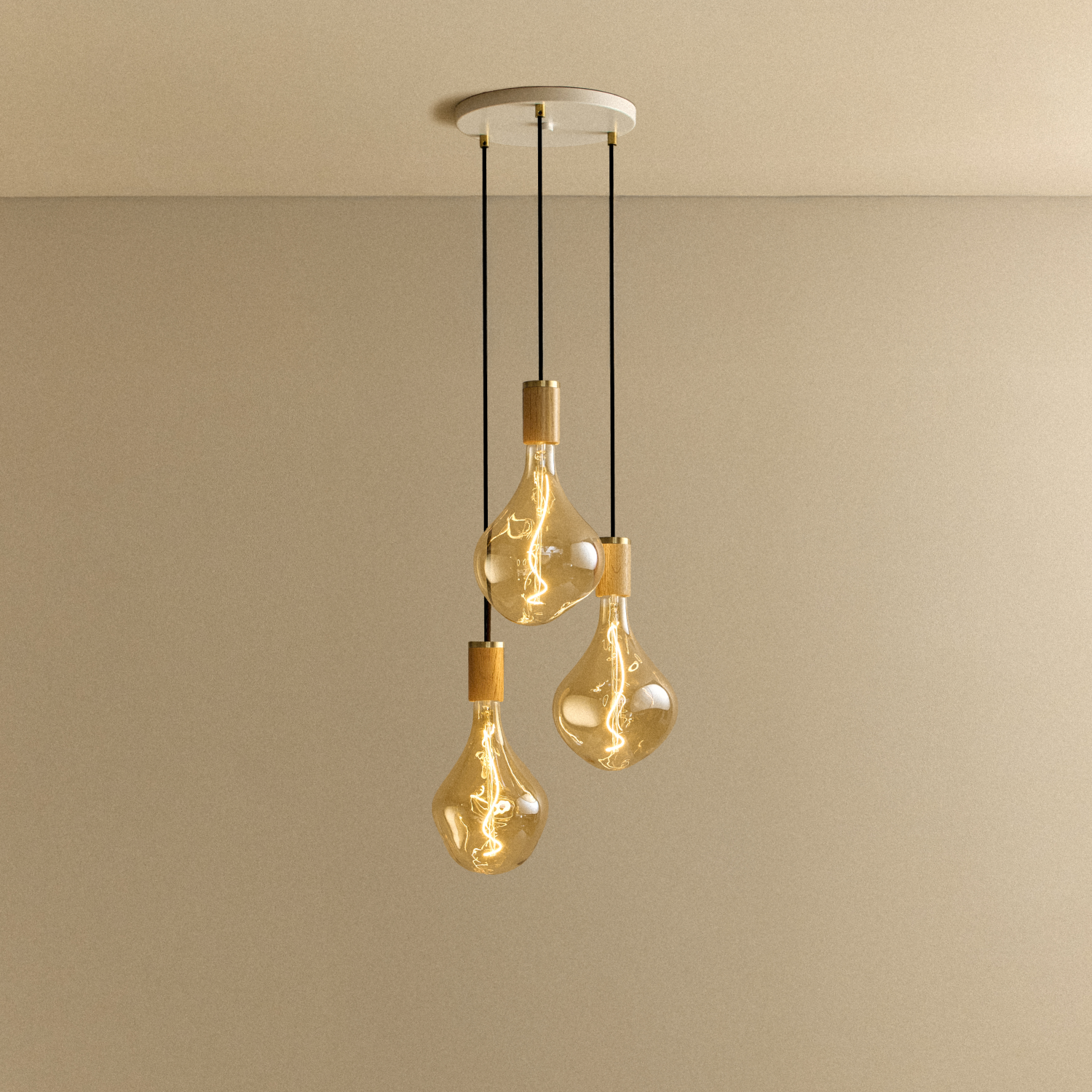 Tala Triple Pendant in Oak + Voronoi II shown illuminated