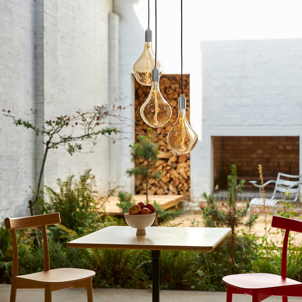 Tala Triple Pendant in Stainless Steel in a styled interior setting (view 4)