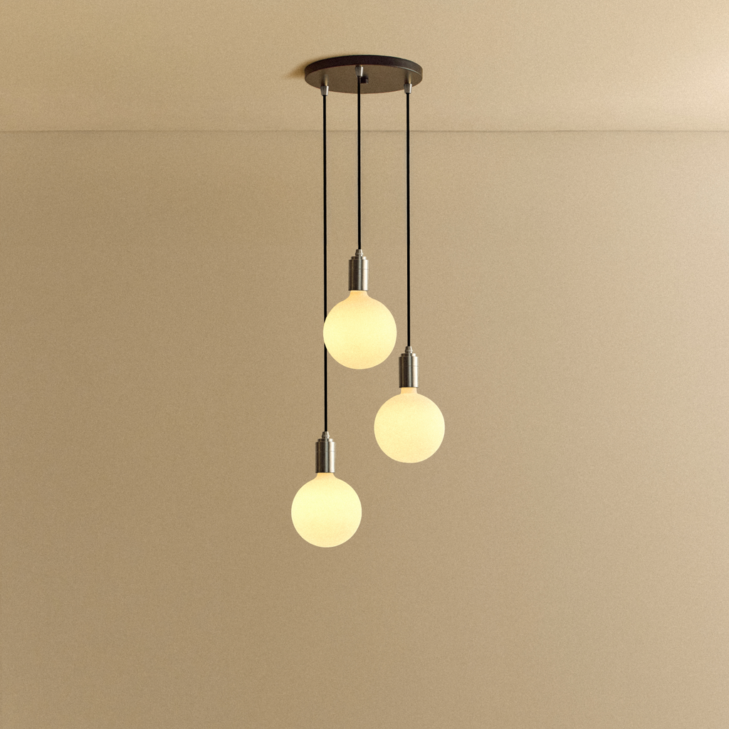 Tala Triple Pendant in Stainless Steel + Sphere IV shown illuminated