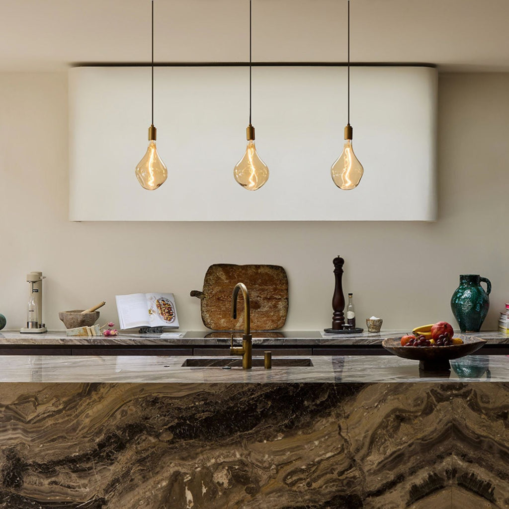 Tala Voronoi II Pendant Light in Brass - Set of 3 in a styled interior setting
