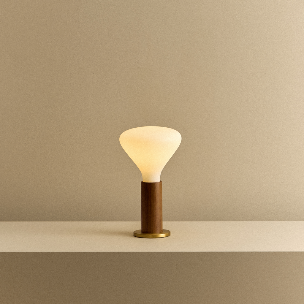 Tala Knuckle Table Lamp in Walnut + Noma shown illuminated