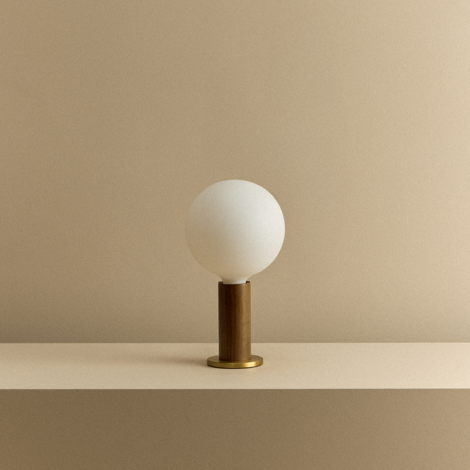 Tala Knuckle Table Lamp in Walnut + Sphere IV shown unlit