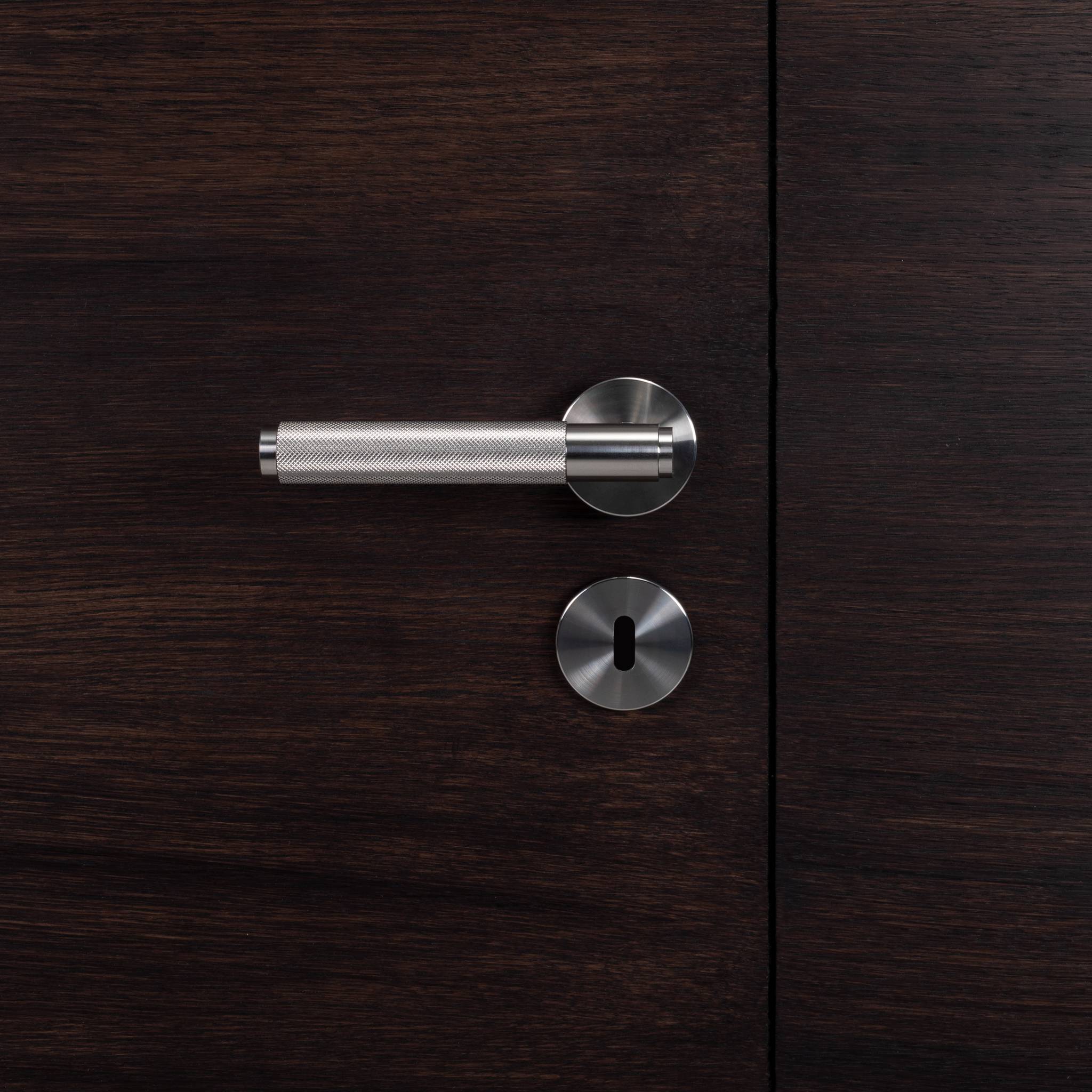 Buster + Punch Cross door handle steel lifestyle by Araco Interiors