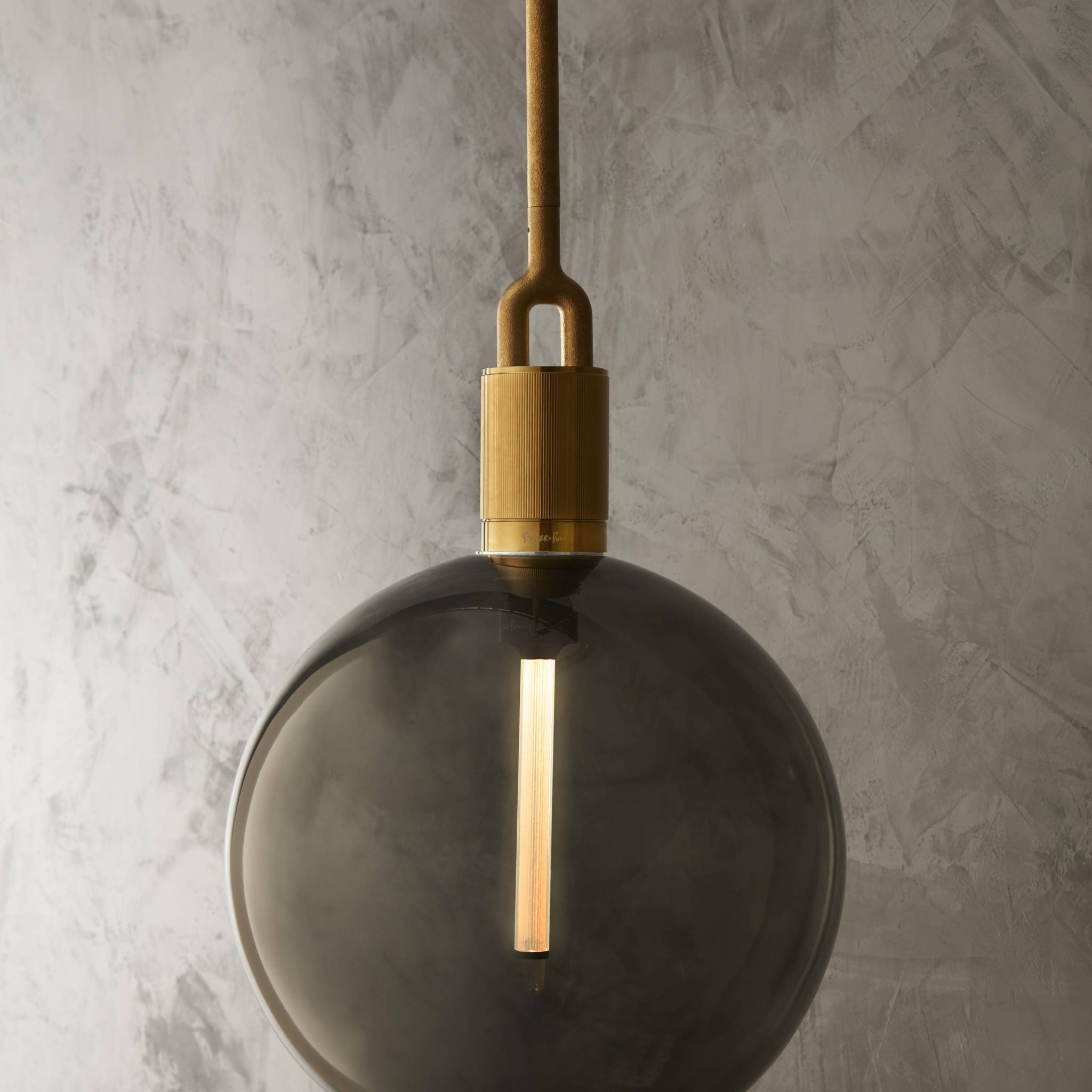 Buster + Punch Forked Pendant in a living room