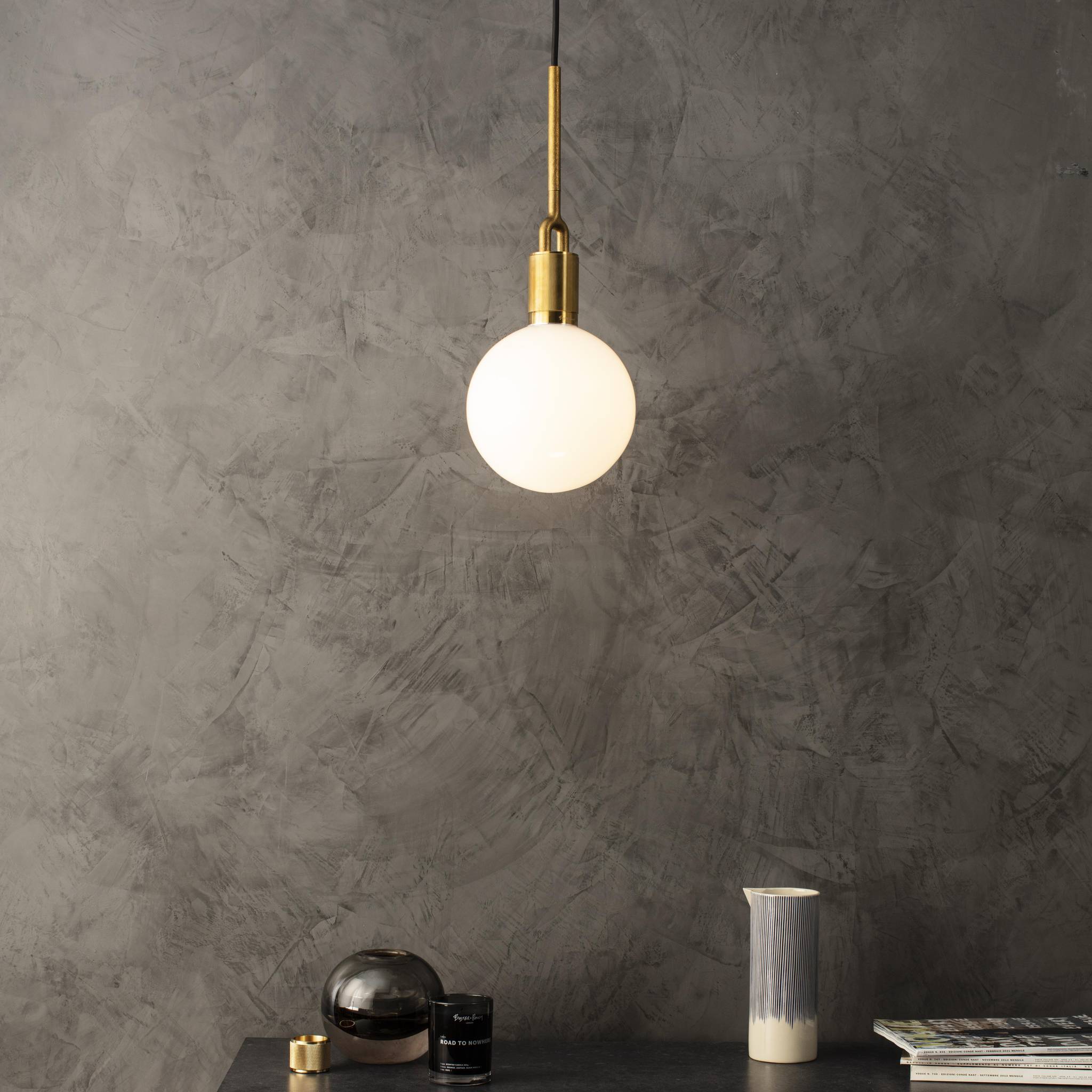 Buster + Punch Forked Pendant in a living room