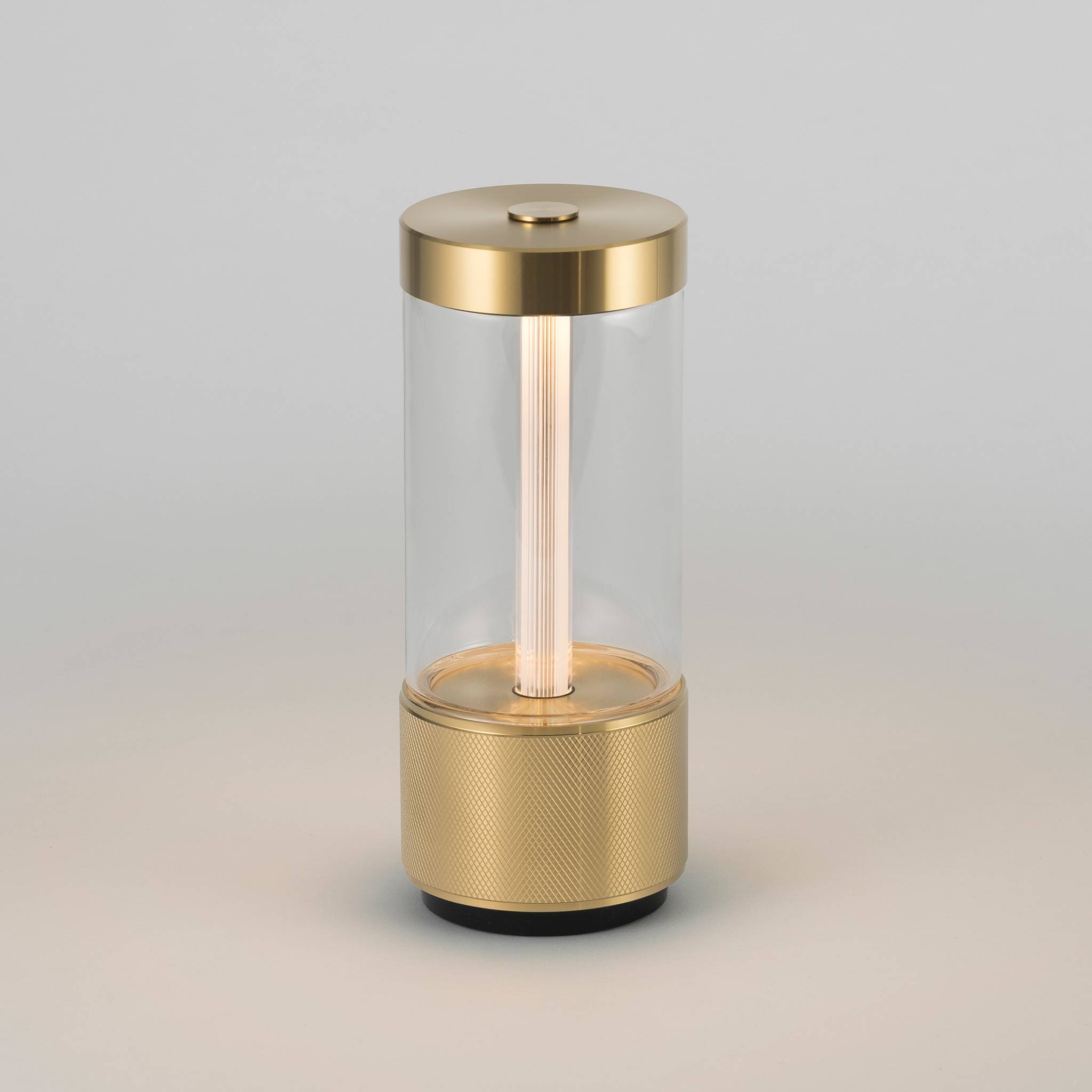 Buster + Punch Takeout portable table light in Brass, lit