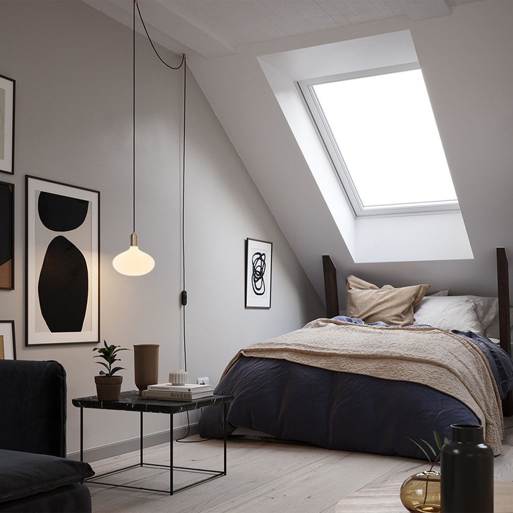 Tala Oval II Plug-In Pendant in Graphite in a styled interior setting (view 2)