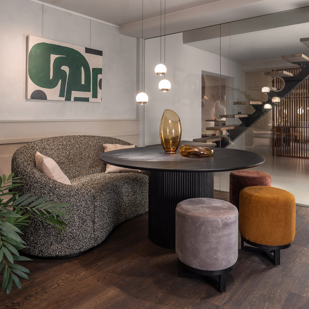 CURVE sofa styled in a living space