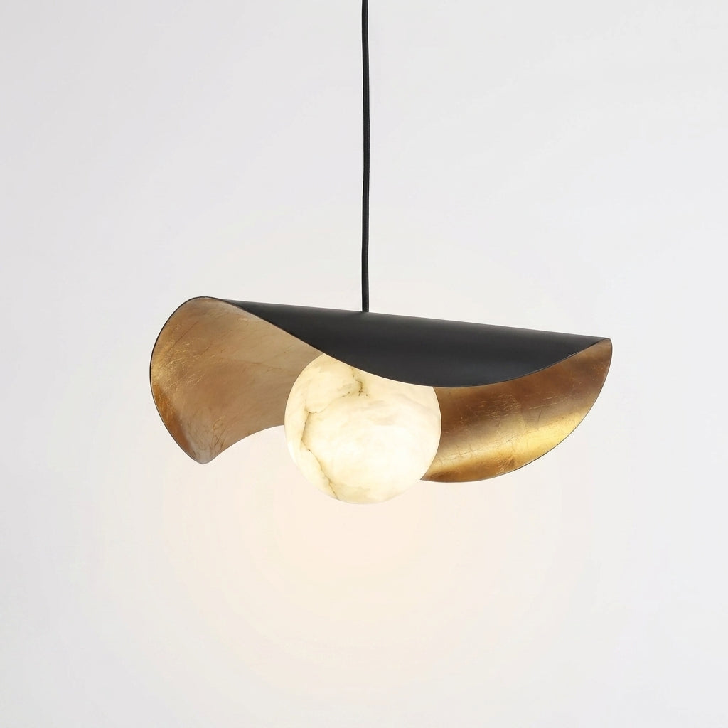 Araco Lumière Frozen Mave pendant light with black and gold stem and alabaster dome shade
