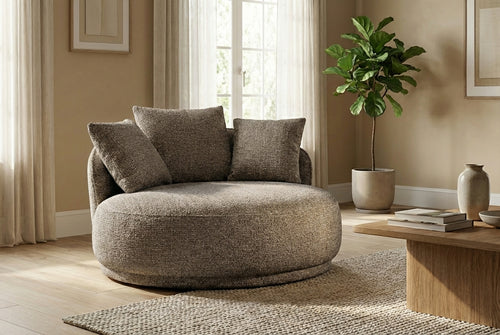 Araco Atelier Otis armchair in Pebbles fabric