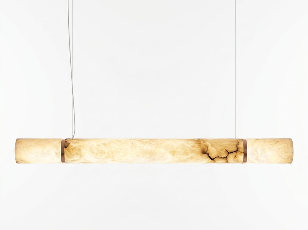 Araco Lumière Frozen Vox linear natural alabaster pendant light over a dining table
