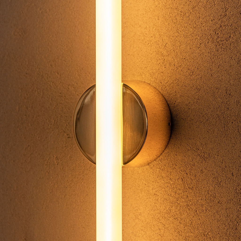 Tala Kilter 1.0 Wall Light in Solid Brass in a styled interior setting (view 2)
