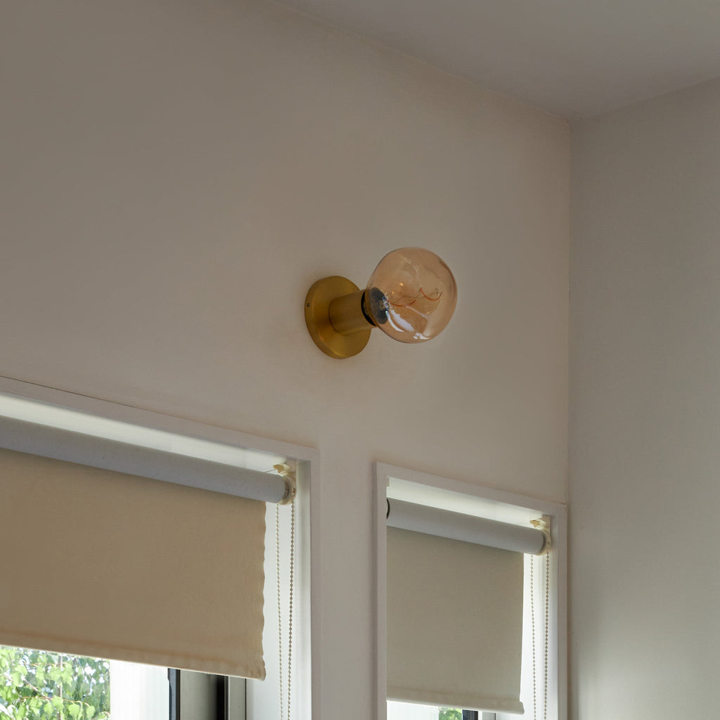 Tala Lochan Wall Light in Brass + Voronoi I in a styled interior setting (view 2)