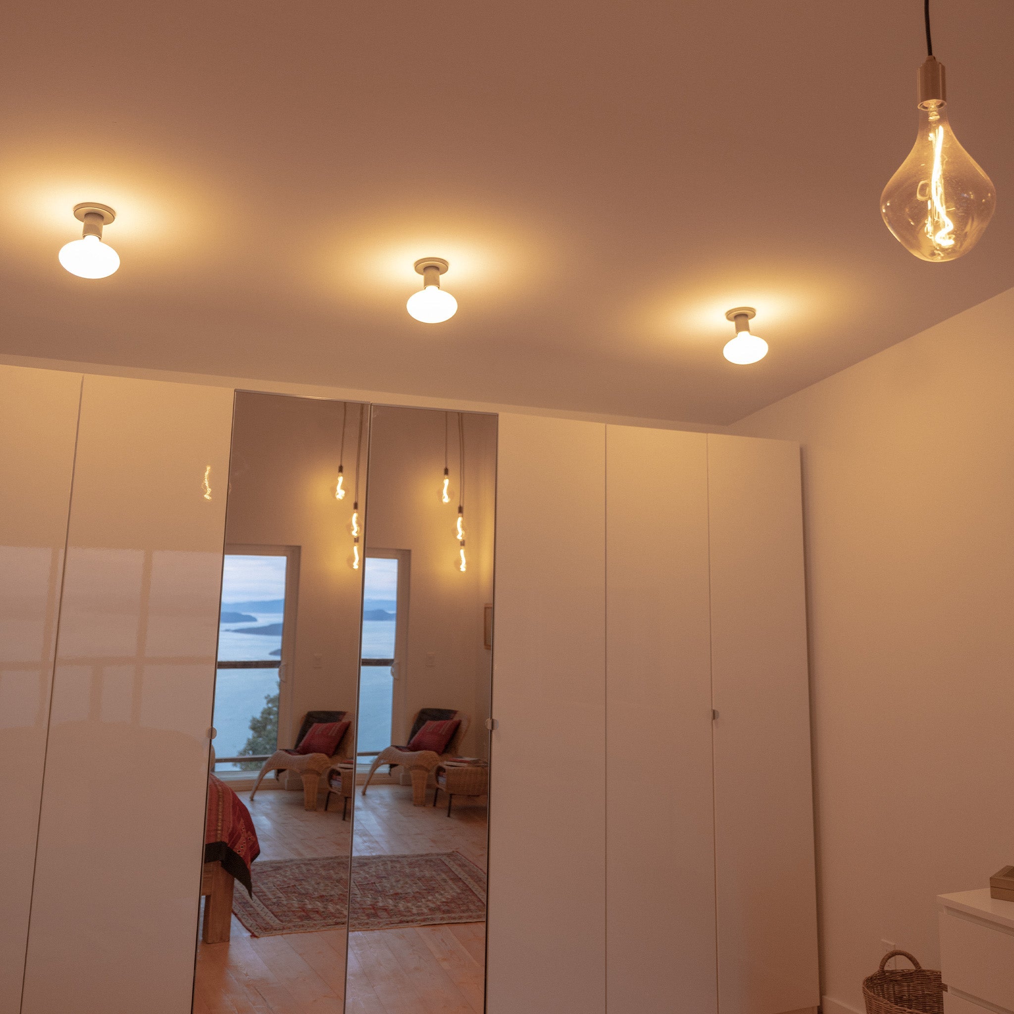 Tala Lochan Wall Light in Graphite + Oval Dim to Warm in a styled interior setting