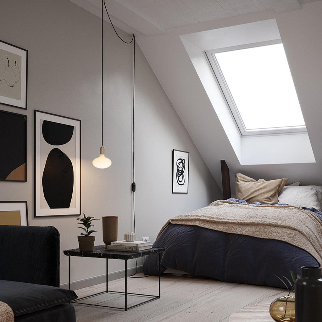 Tala Oval Plug-In Pendant in Graphite in a styled interior setting (view 2)